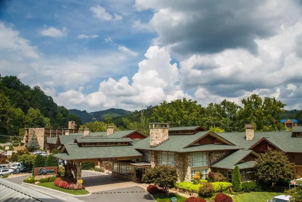 the grey stone lodge on the river